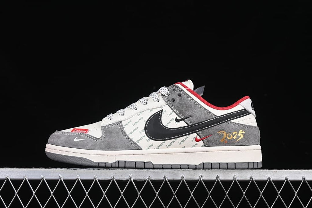Side view highlighting the black Swoosh and patterned panels