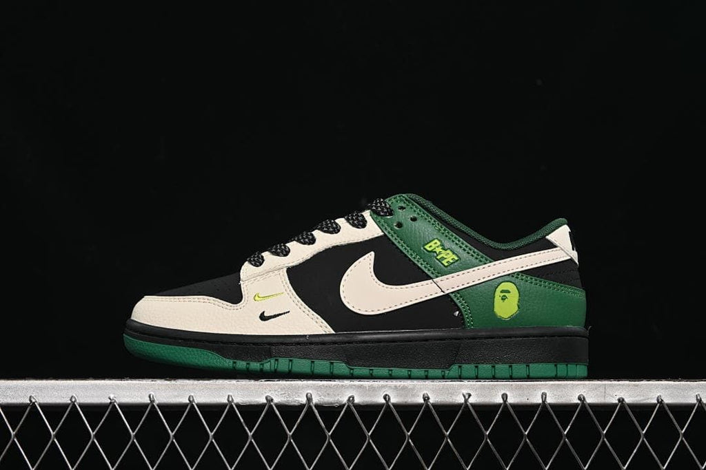 Side view of a black, cream and green low-top sneaker with contrasting Swoosh and patterned laces