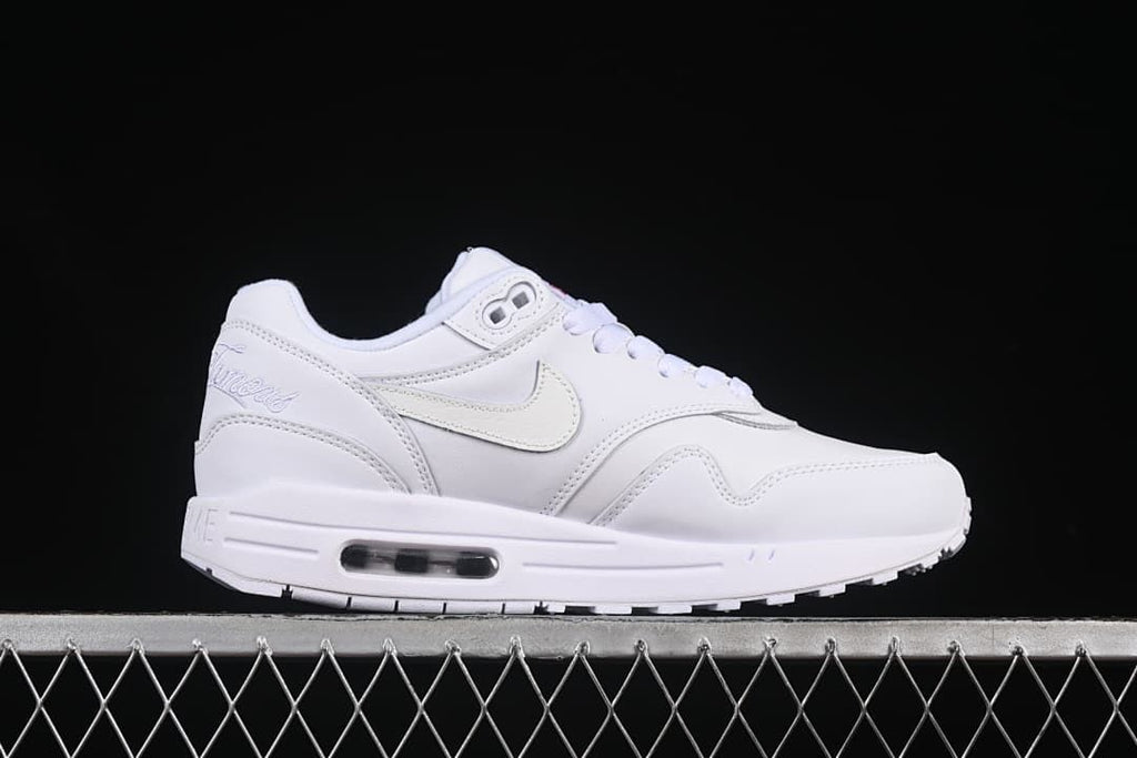 Side profile of the white Nike Air Max 1 with a visible heel Air unit