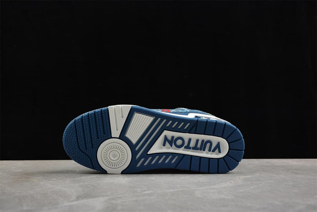 Underside of a sneaker showing a blue-and-white patterned outsole.
