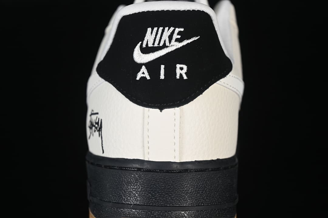 Close-up of the heel tab and signature-style heel graphic
