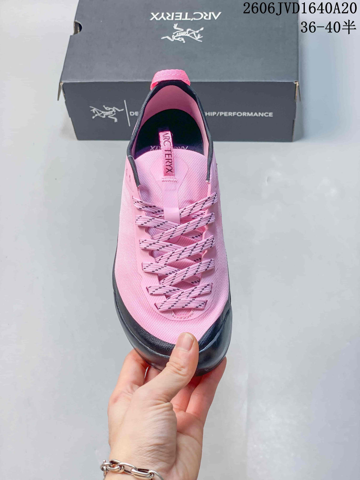 Top view showing the shoe laces, tongue, and pink upper
