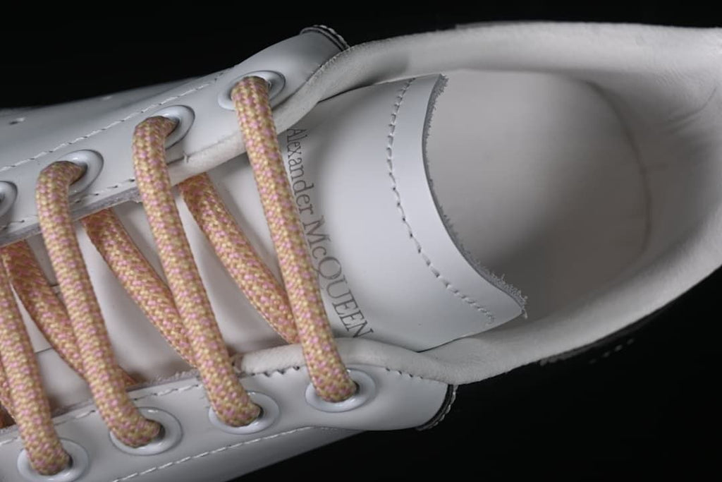 Angled close-up of the tongue, laces, and shoe opening