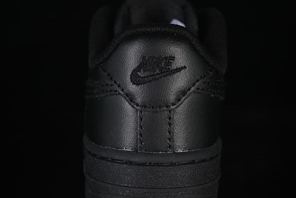Rear view of the black sneaker with heel branding