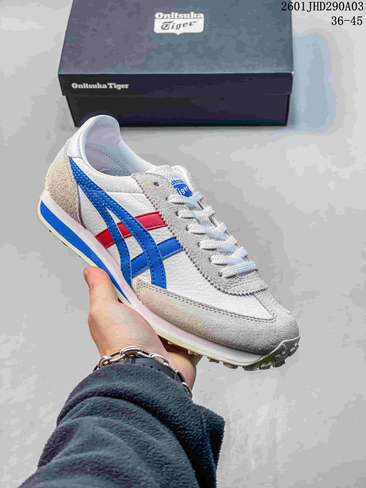 White and gray Onitsuka Tiger EDR 78 sneaker with blue and red accents.