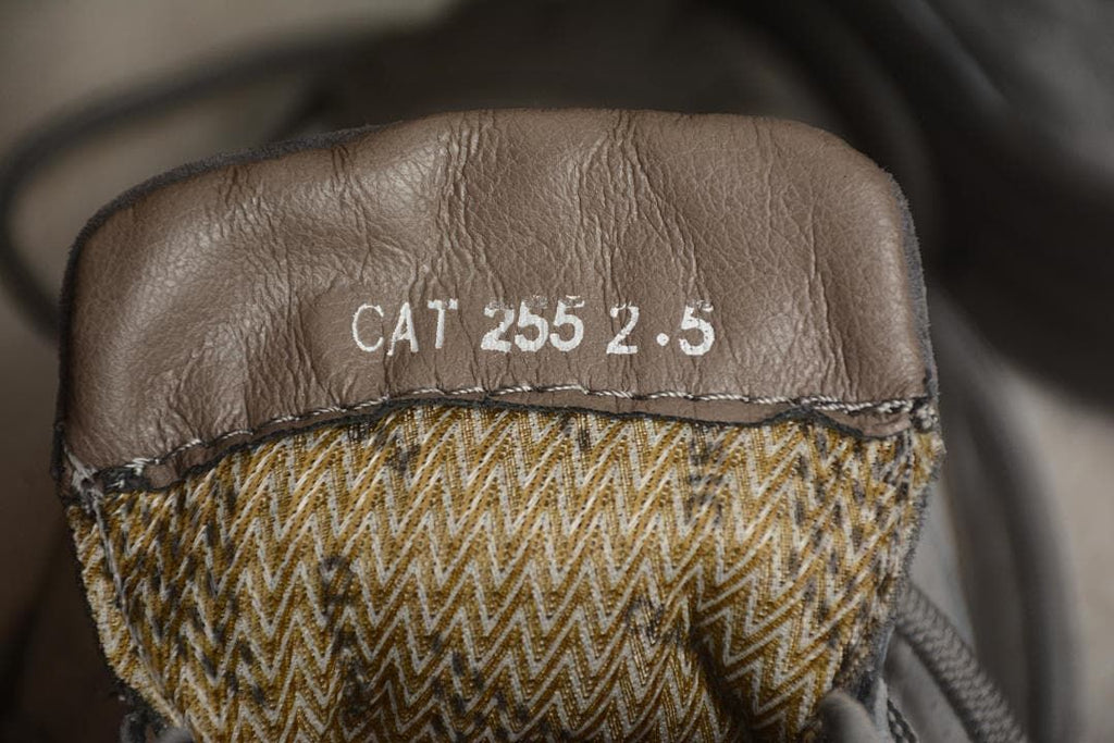 Close-up of the tongue with printed CAT sizing text.