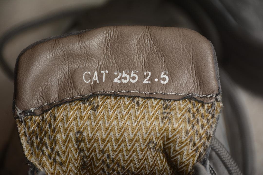 Close-up of the tongue with printed CAT sizing text.