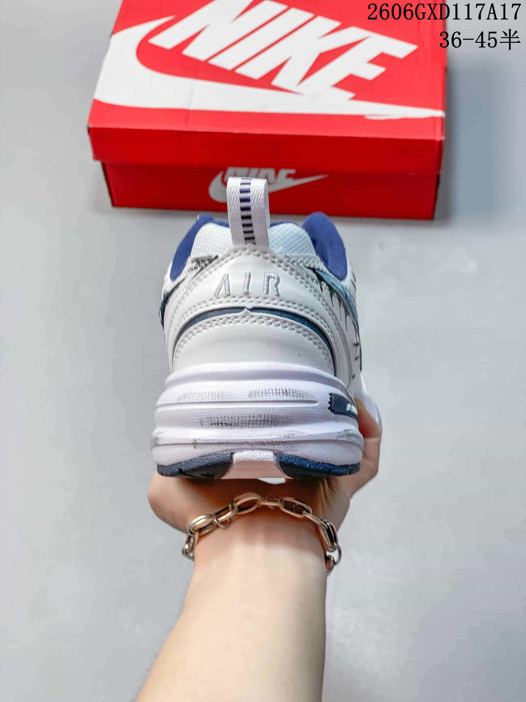 Rear view showing the heel, pull tab, and layered sole