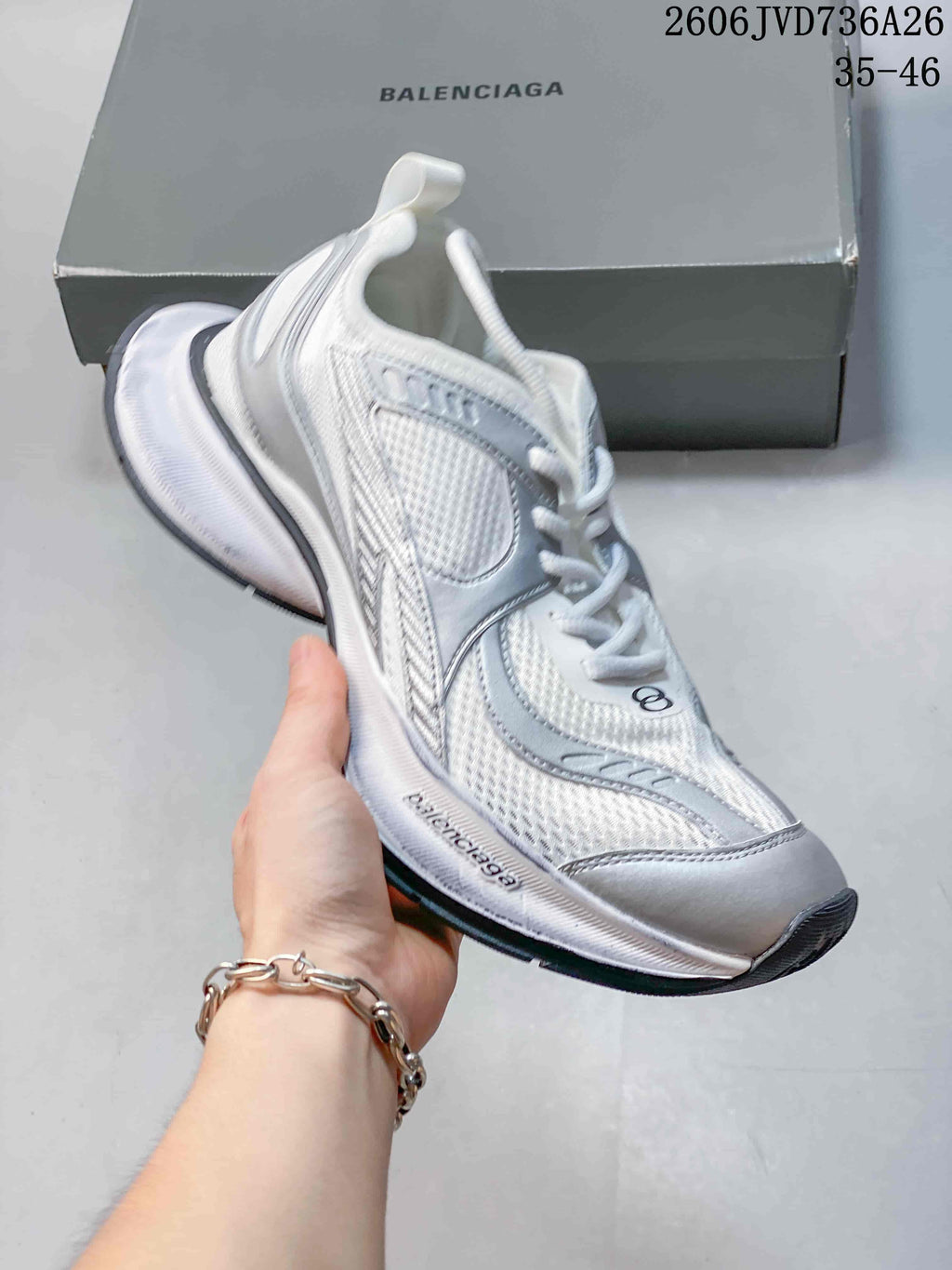 White and silver-gray Balenciaga Circuit-style sneaker with a thick sole