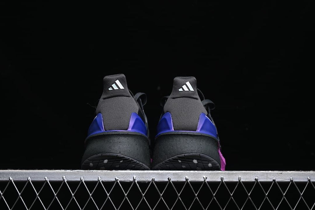Rear view of the pair showing blue-purple heel details
