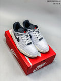 Pair of white and black Nike Full Force Low sneakers displayed on a red shoe box