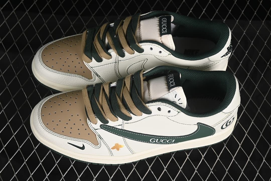 Overhead view of a pair of off-white low-top sneakers with brown toe panels and dark green and brown laces.