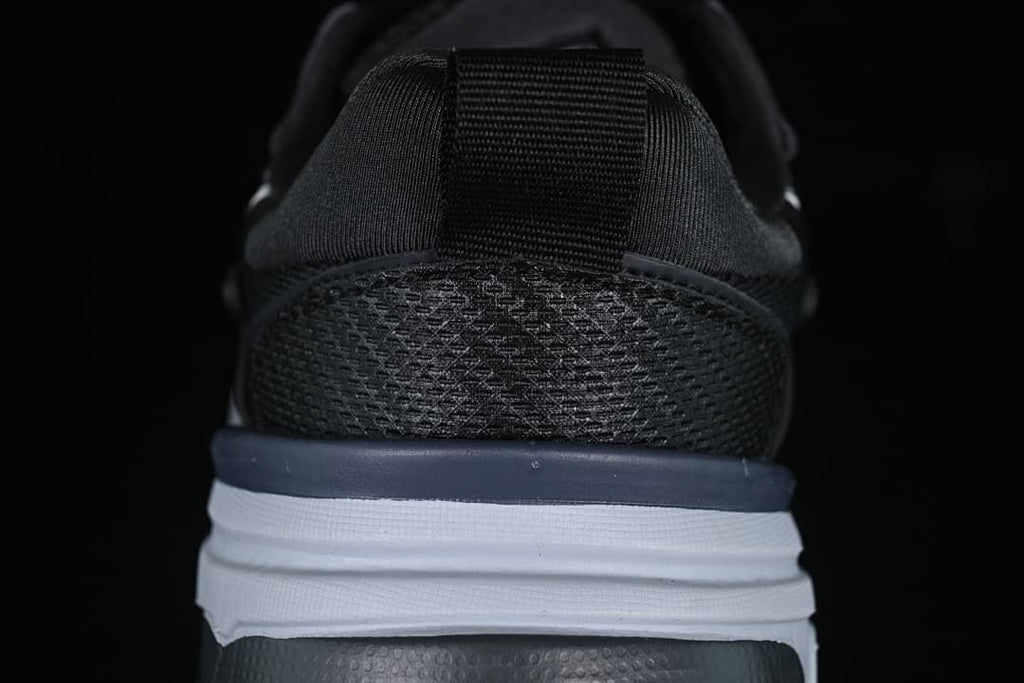 Rear view showing the heel panels and layered sole