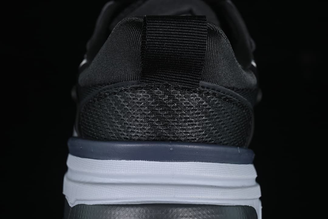 Rear view showing the heel panels and layered sole