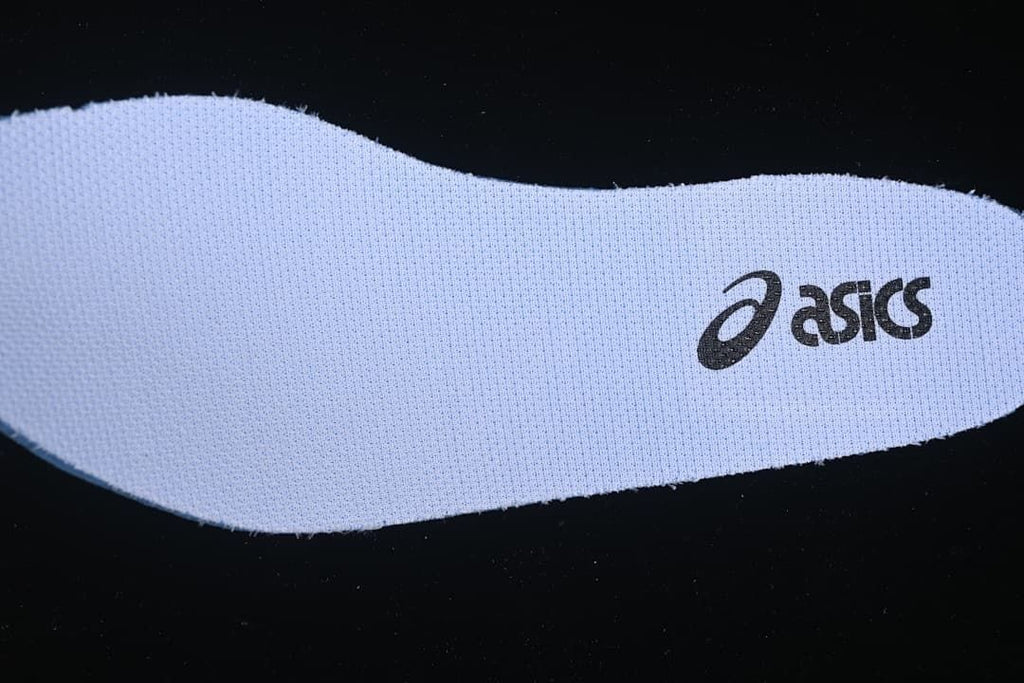 White insole with ASICS logo.