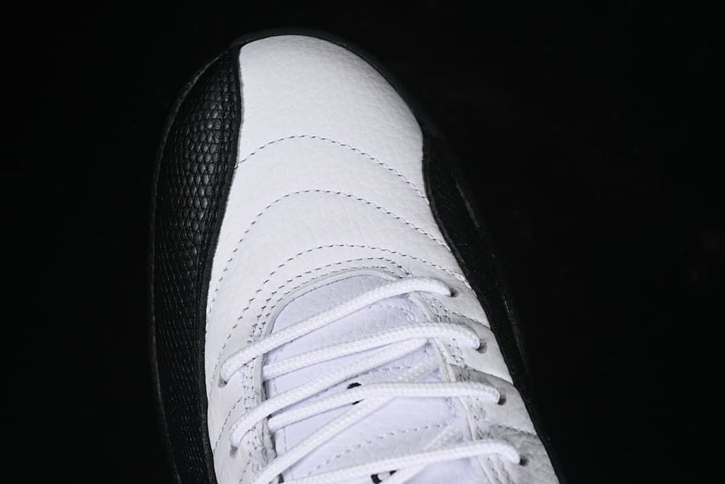 Top view highlighting the white laces and stitched toe area.