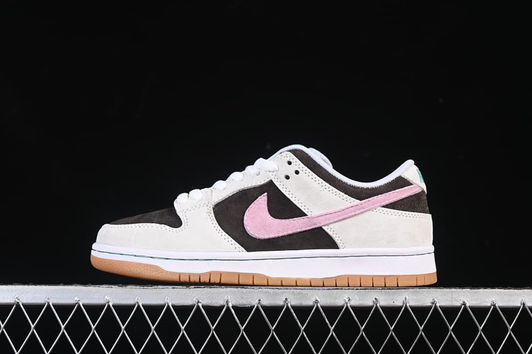 Side profile of the shoe against a dark background