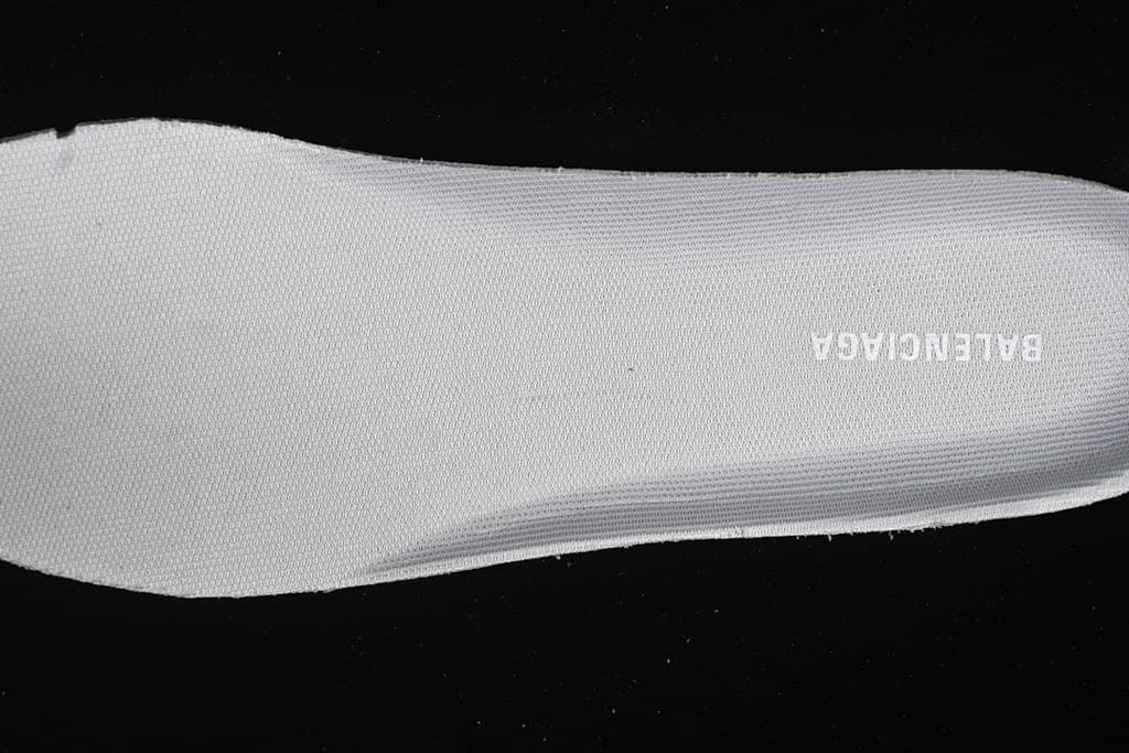 Close-up of the insole with a visible brand marking.