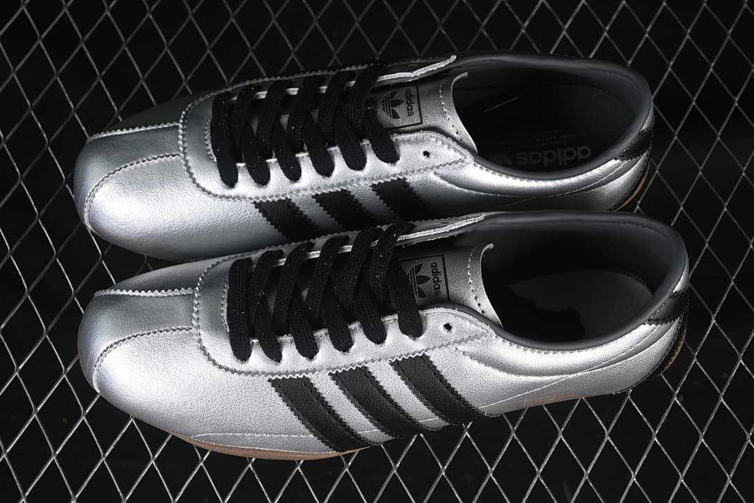 Pair of silver adidas Tokyo sneakers viewed from above