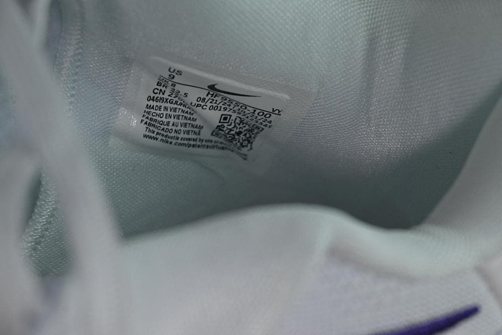 Inside shoe label showing US size 9 and style code HF9550-100