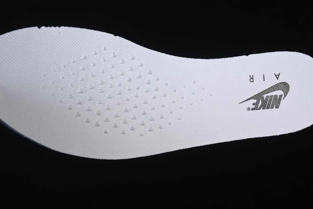White insole with printed Nike branding and textured detail