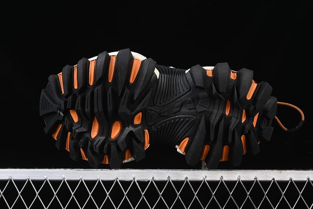 Underside view showing the deep, chunky outsole tread