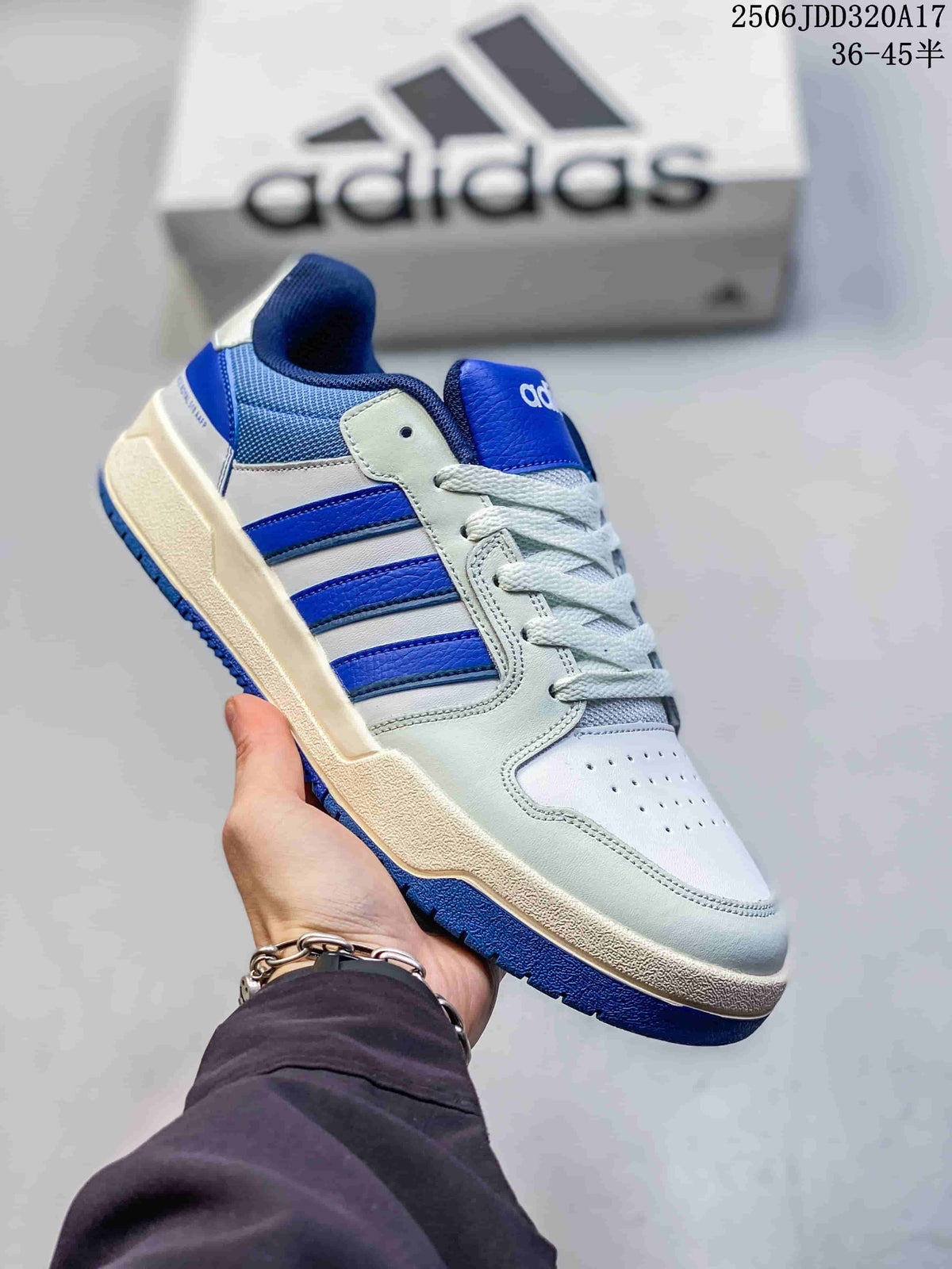 Close side view of the white and royal-blue sneaker