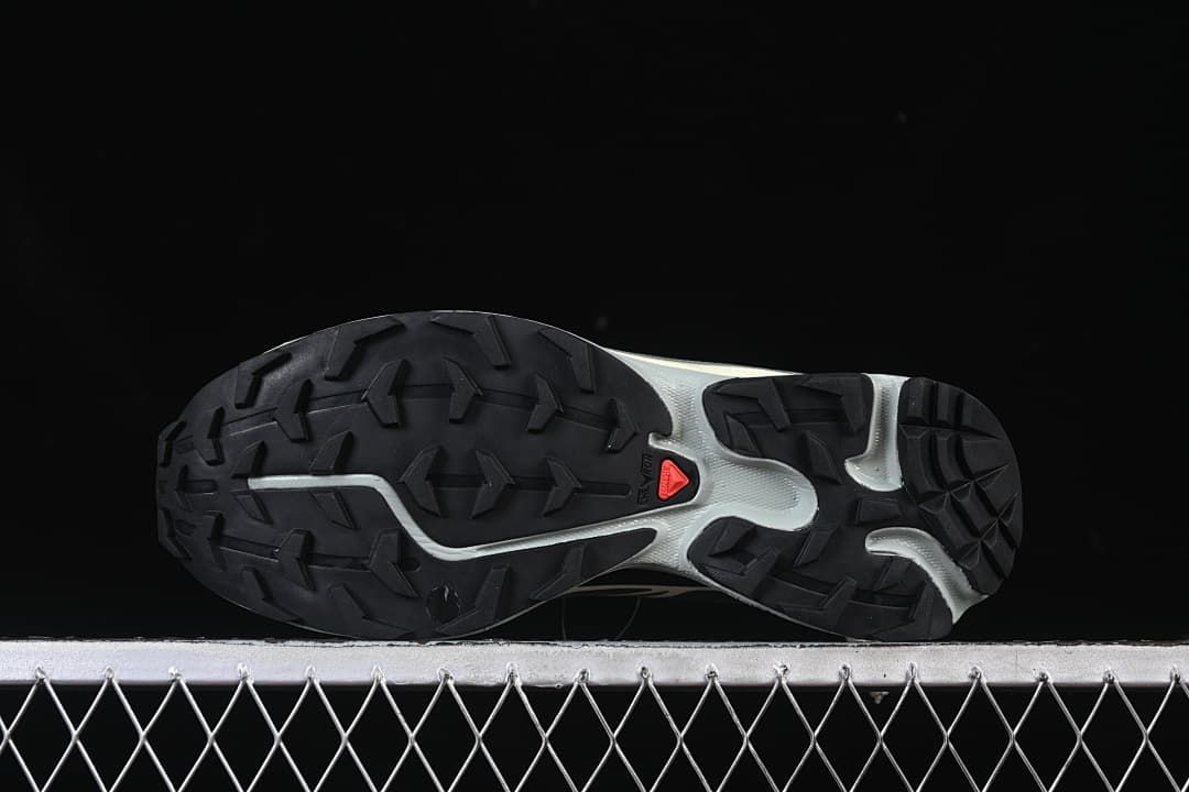 Underside view showing the lugged outsole pattern.