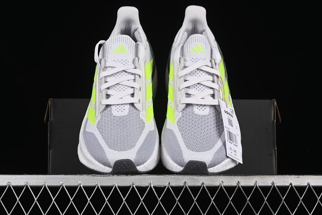 Front view of the pair showing the toe shape and lime side accents.