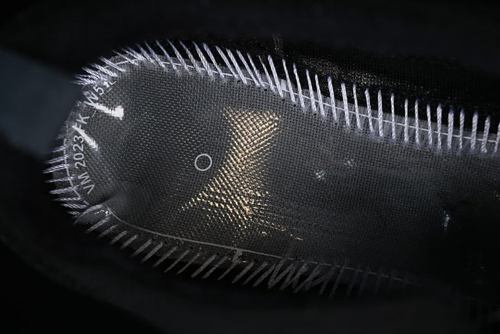 Close-up of the shoe interior and stitching.