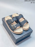 Blue two-strap buckle slide sandals on an ECCO-branded box; image overlay shows style code 2606JJD514A04 and sizes 39–44.