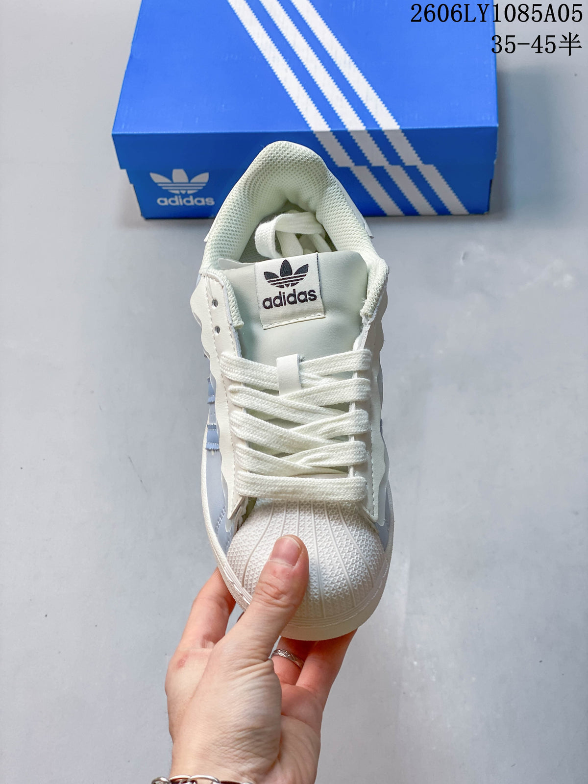 Front view showing the shell toe, laces and tongue logo