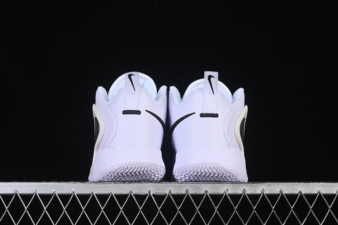 Rear view of the pair showing heel details and patterned outsoles.