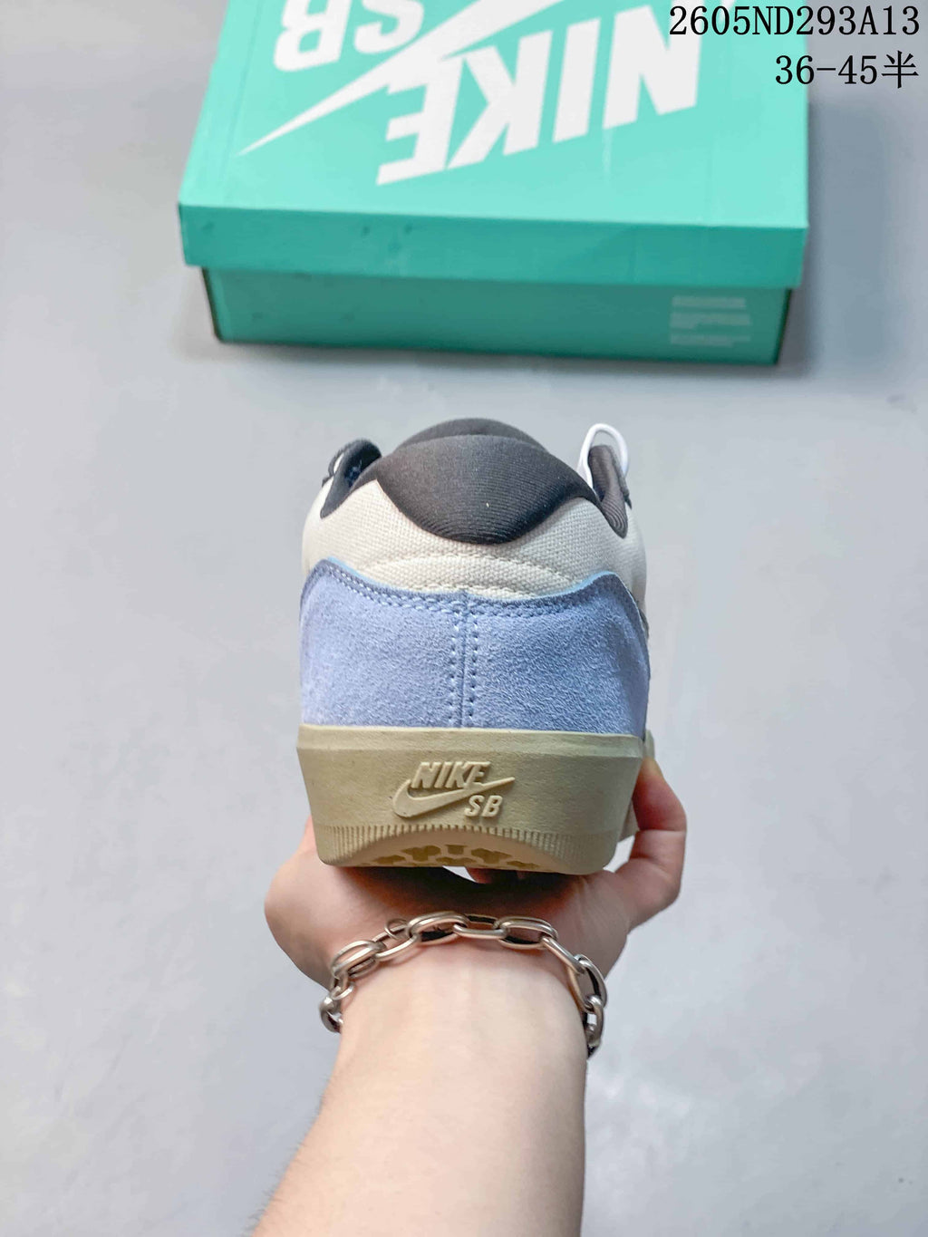 Rear view showing the blue heel panel and Nike SB branding on the sole