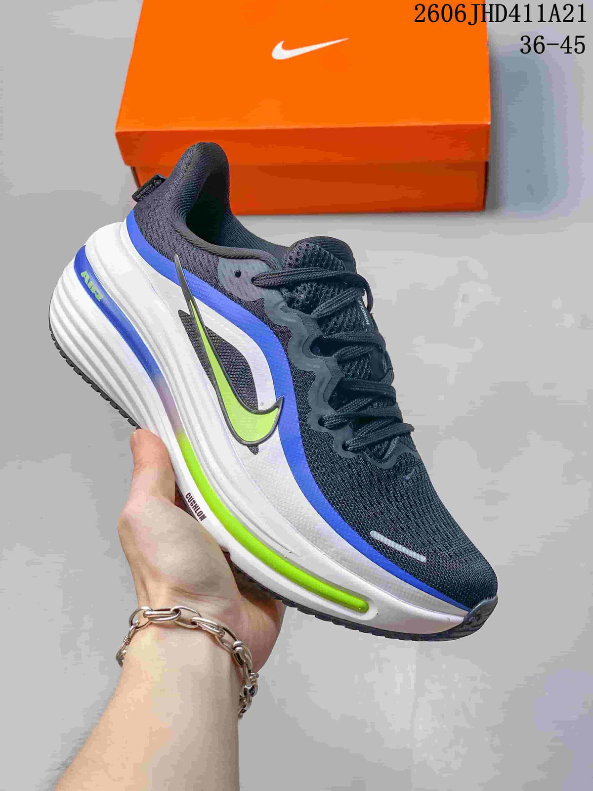 Dark upper Nike Air Zoom Winflo 12 with blue and lime accents and a white sole