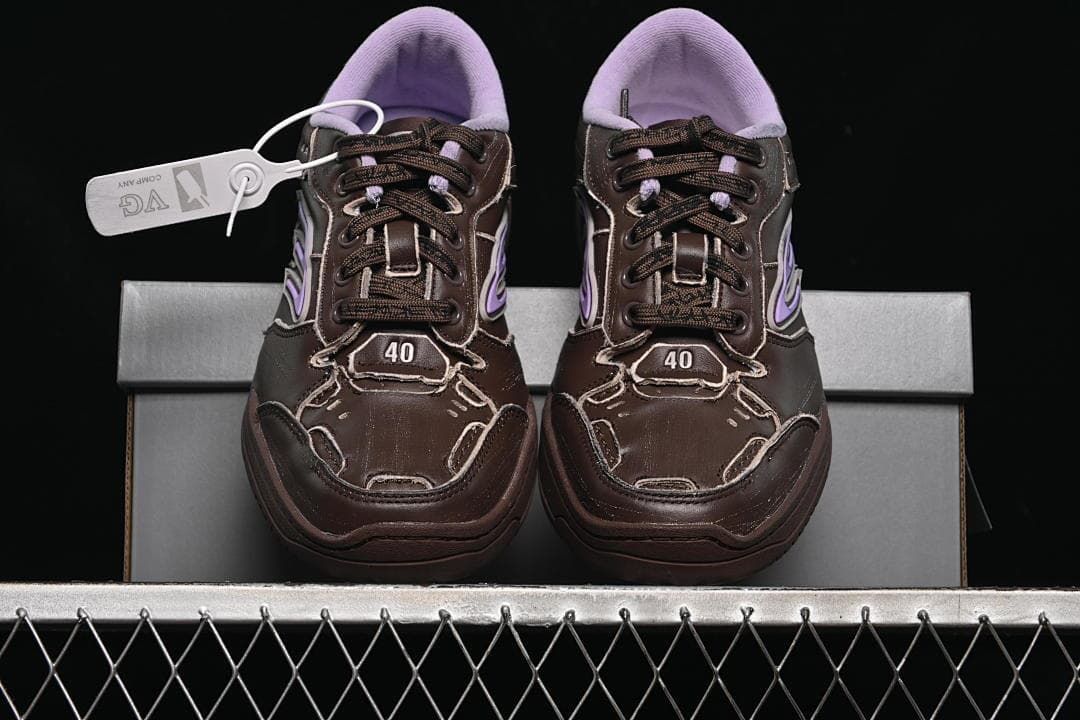 Front view of the pair showing lavender collars and brown lace-up uppers