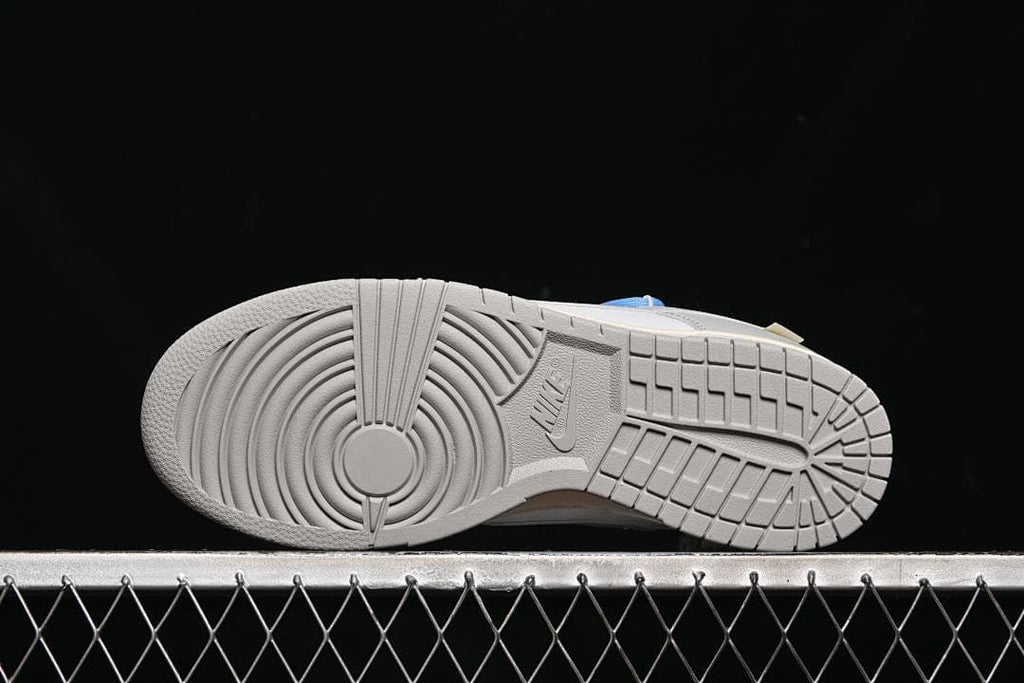 Underside view showing the grey patterned rubber outsole