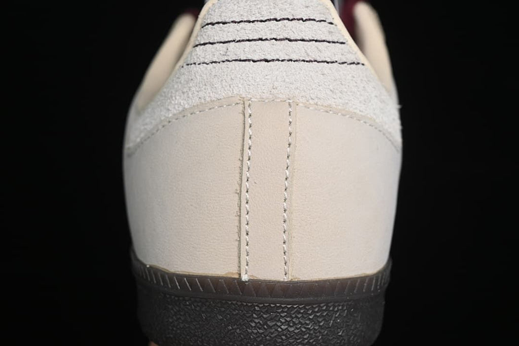 Rear view showing the light heel panel and dark outsole.