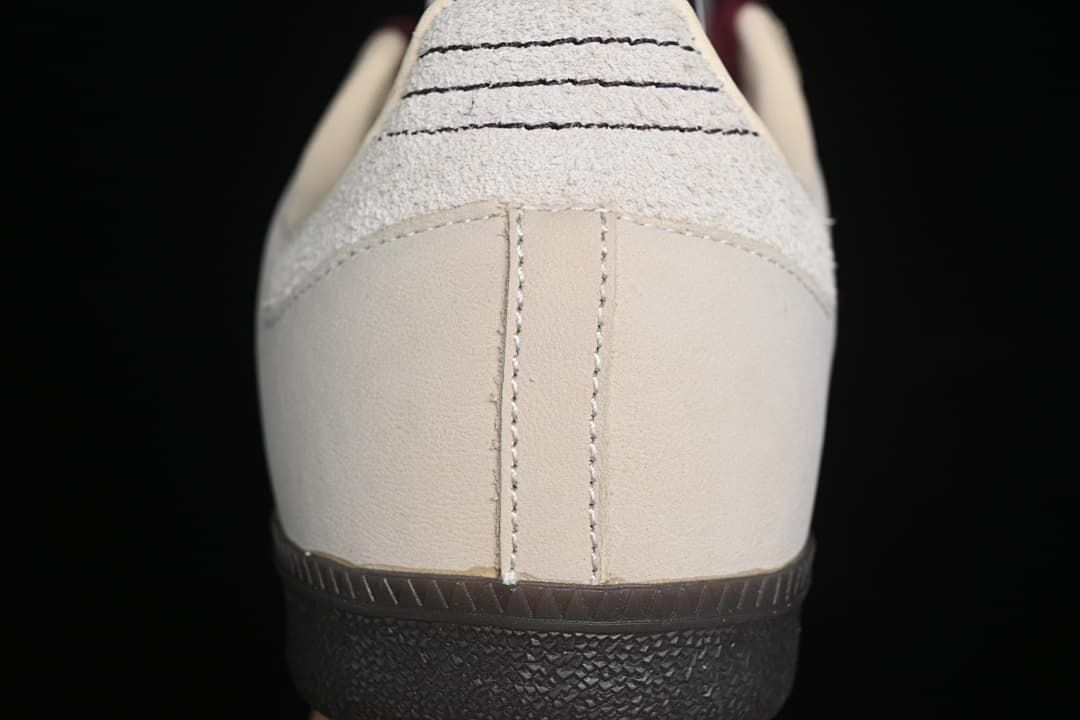 Rear view showing the light heel panel and dark outsole.