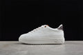 White Time Out Low platform sneaker with brown heel accent and sawtooth-style sole