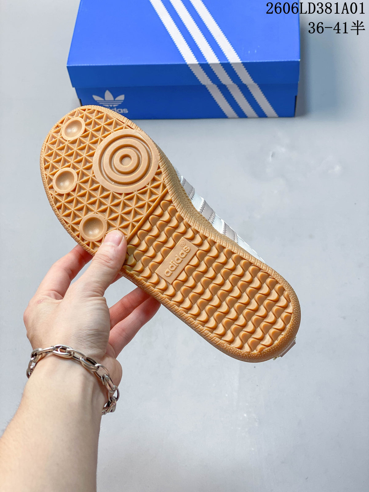 Close-up of the gum-colored outsole with textured tread on an Adidas Samba Jane sneaker.
