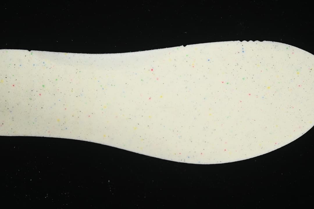 Close-up of a pale insole with multicolor speckles