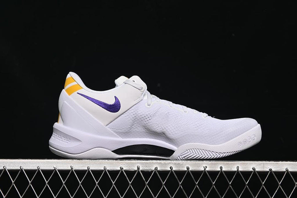 Side profile showing the low-cut silhouette and contrasting outsole