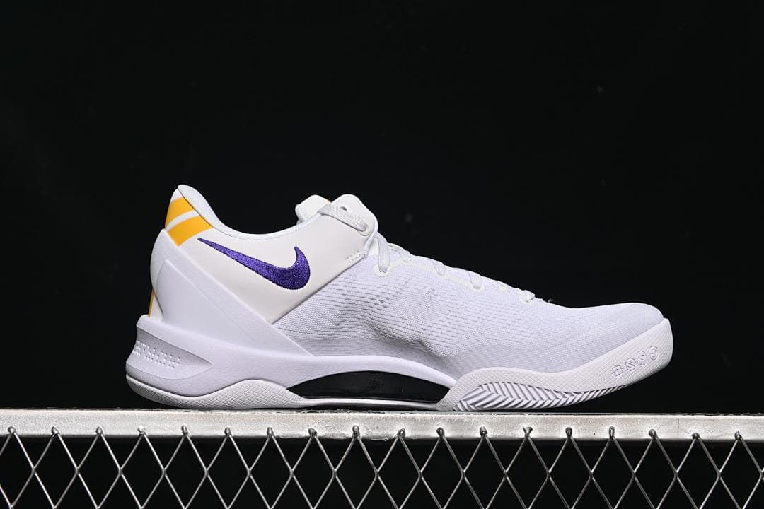 Side profile showing the low-cut silhouette and contrasting outsole
