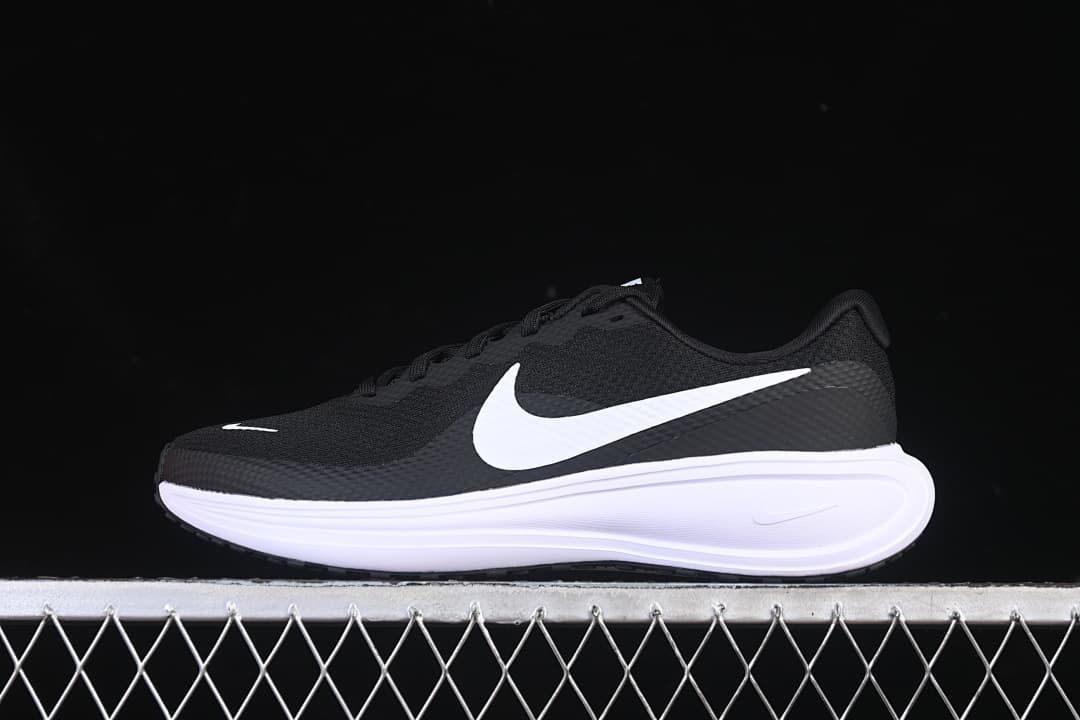 Side view of a black Nike Revolution 8 running shoe with white Swoosh and midsole