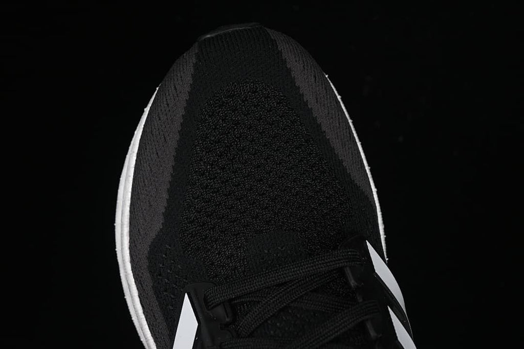 Top view of the black knit-look toe and lace area
