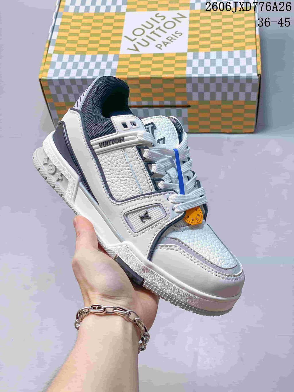 White and gray Louis Vuitton Trainer Low sneaker with dark collar detailing