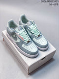 Pair of pale blue and white Nike Air Force 1 '07 Low sneakers shown from above