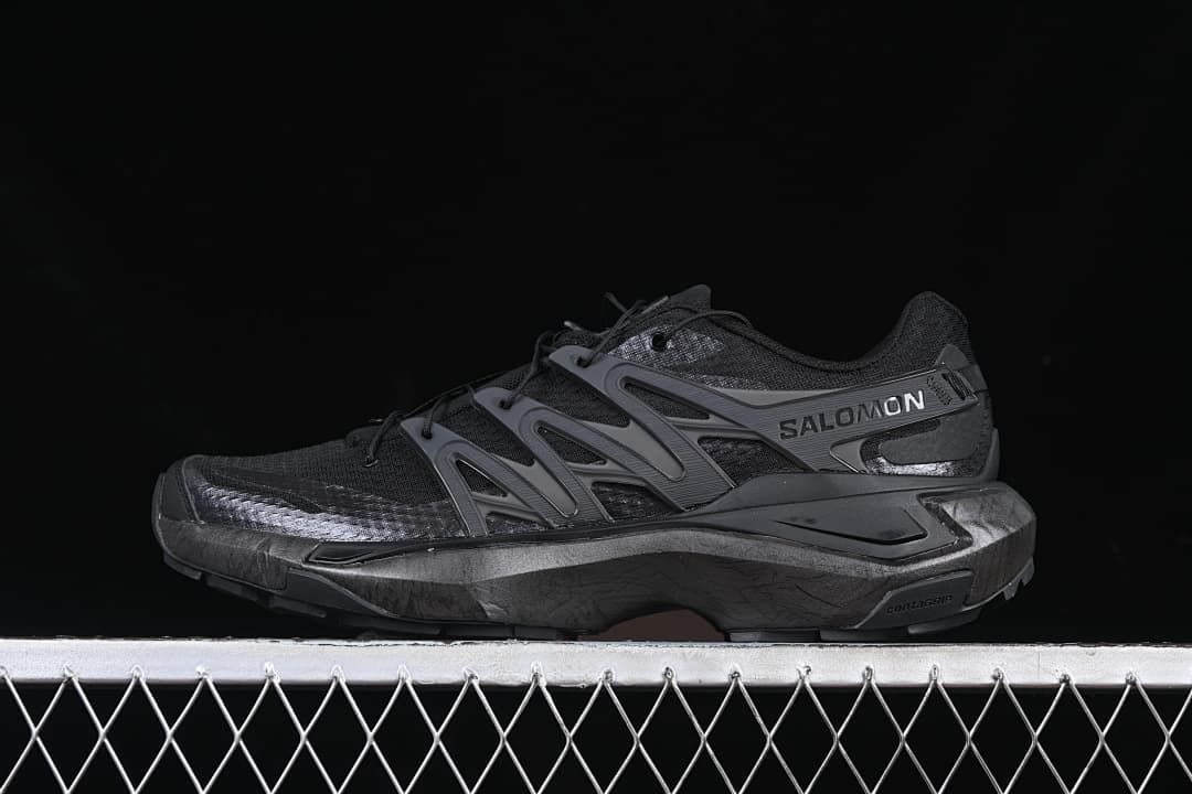 Side view of a black and dark grey Salomon XT Pure Advanced trail shoe.