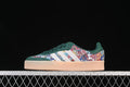 Side view of green adidas Samba JH7289 sneakers with floral-patterned panels, light stripes, and gum-toned sole.